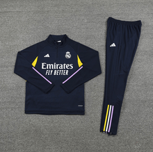 Real Madrid Trainingsanzug mit halbem Reißverschluss